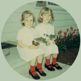 Carla and Angie are showing off potted ivies in a snapshot that also shows off Mae Dean's tulips