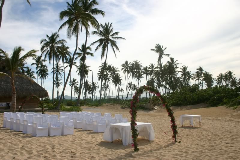 Pic of wedding on the beach set up Click the image to open in full size