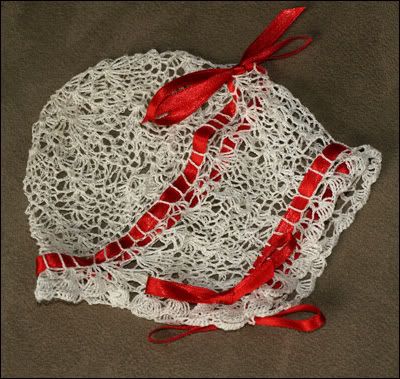 White thread crochet baby bonnet