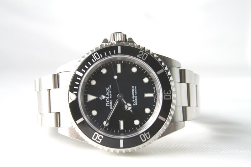 http://i132.photobucket.com/albums/q7/texaswatchandgold/Rolex/12-0-071190.jpg?t=1201650667